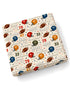 Football-themed fabric with helmets and footballs in various colors and numbers on a light background.