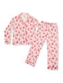 Pink pajama set featuring a floral and bow print, includes a long-sleeve top and matching pants.