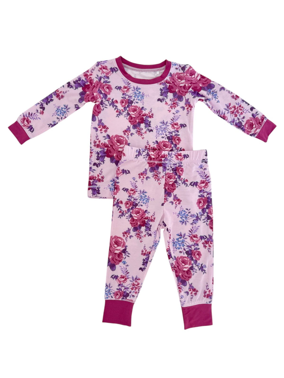 Pink floral children's pajama set with long sleeves and pants featuring purple accents.