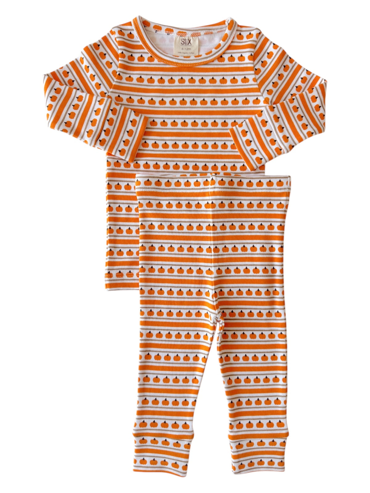 Pumpkin-patterned toddler pajamas in orange and white, featuring long sleeves and matching pants.