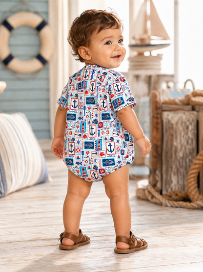 Smiling baby in a colorful nautical outfit, viewing the scene from behind in a bright, beach-themed setting.