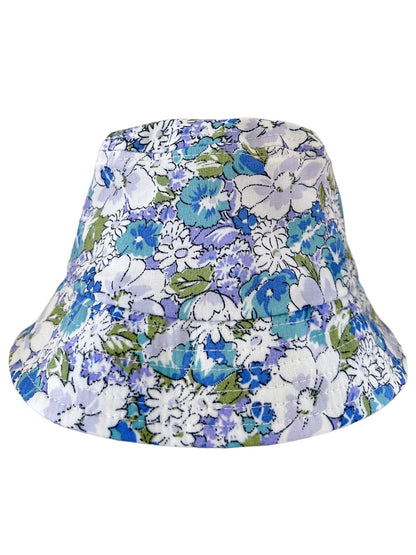 Floral-patterned bucket hat featuring blue, green, and white flowers on a light background.