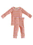 Children's pajama set featuring long-sleeve top and leggings with a pumpkin pattern on a pink striped background.