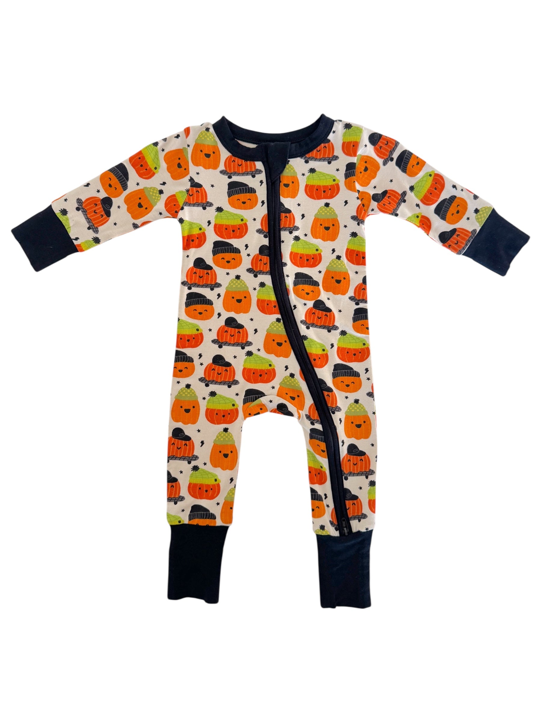 Colorful baby pajamas featuring cute pumpkin and ghost illustrations, perfect for Halloween.