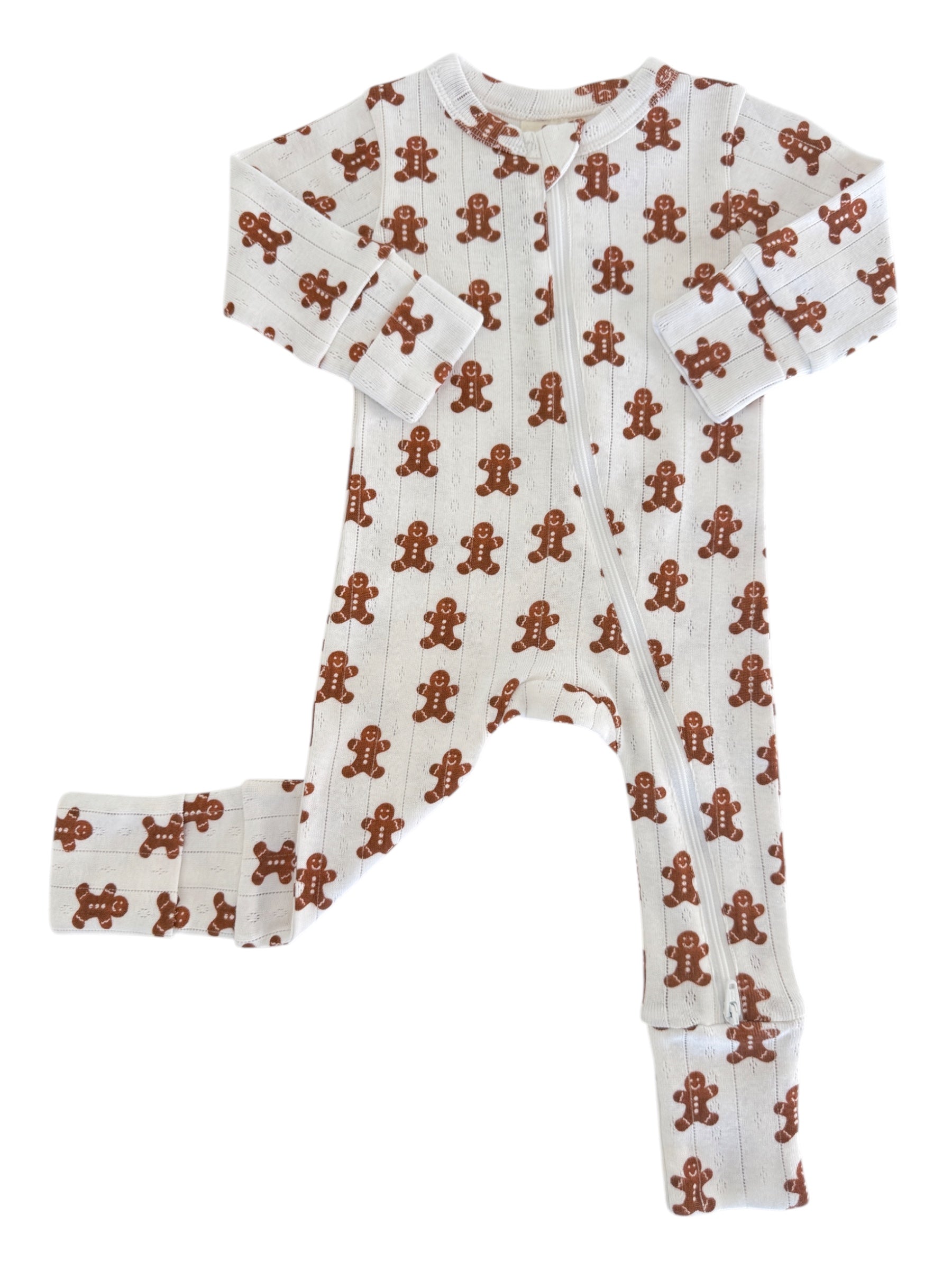 Gingerbread-themed children's onesie with long sleeves and a front zipper, featured on a white background.