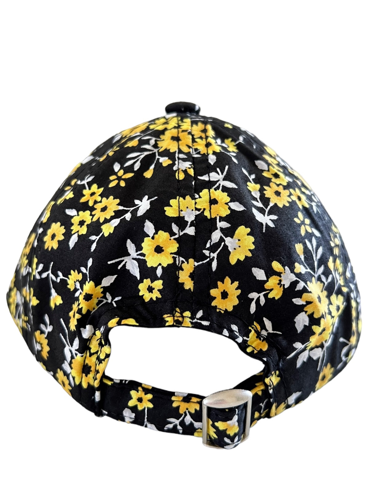 Black floral cap with yellow flowers, showing the back with an adjustable strap.