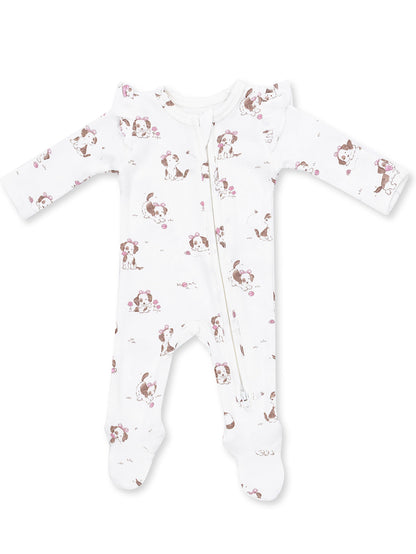 White baby onesie with a cute dog print and floral accents, featuring a front zipper and long sleeves.
