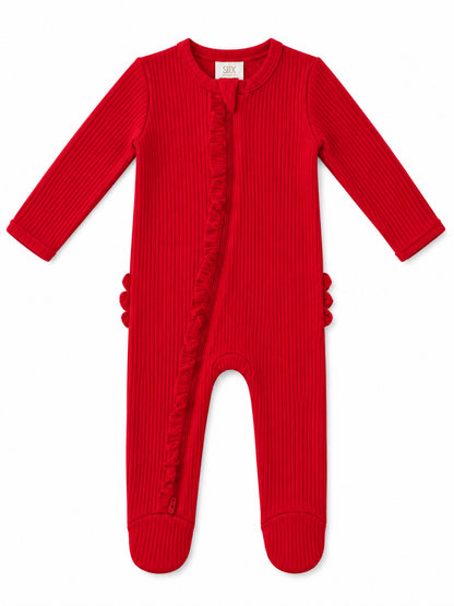 Red baby onesie with ribbed texture and ruffle detailing, featuring long sleeves and footed design.