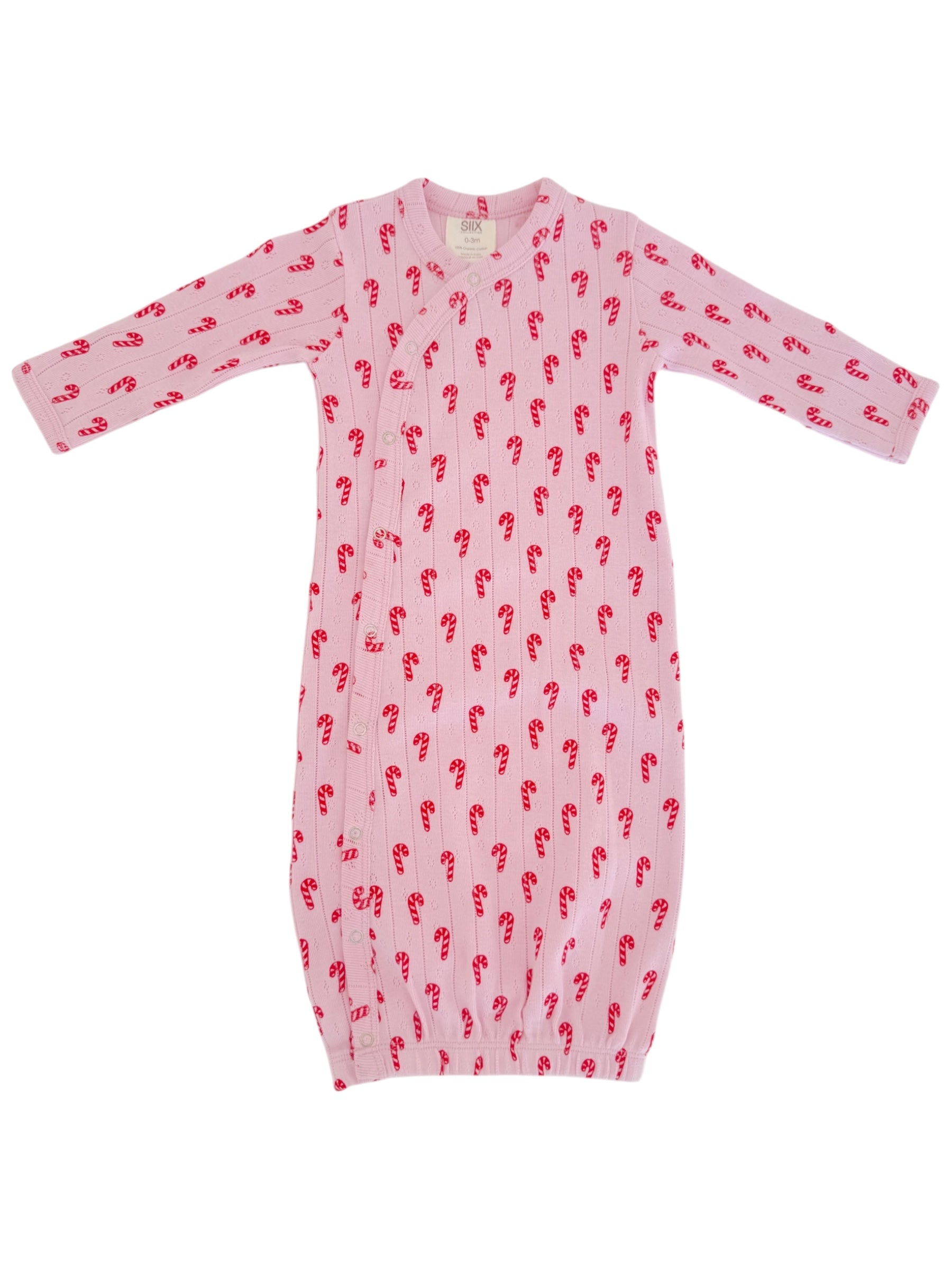 Pink baby gown with candy cane pattern and long sleeves, featuring snap buttons for easy dressing.
