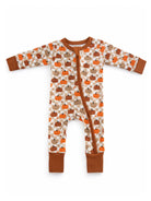 Infant zip-up romper with colorful pumpkin print on a cream background and brown accents.