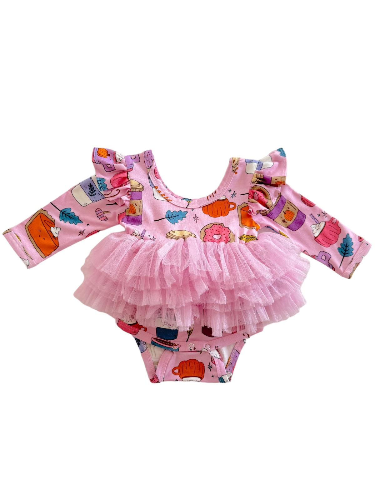 Pink ruffled toddler swimsuit with fun dessert prints on the fabric. Ideal for playful summer outings.