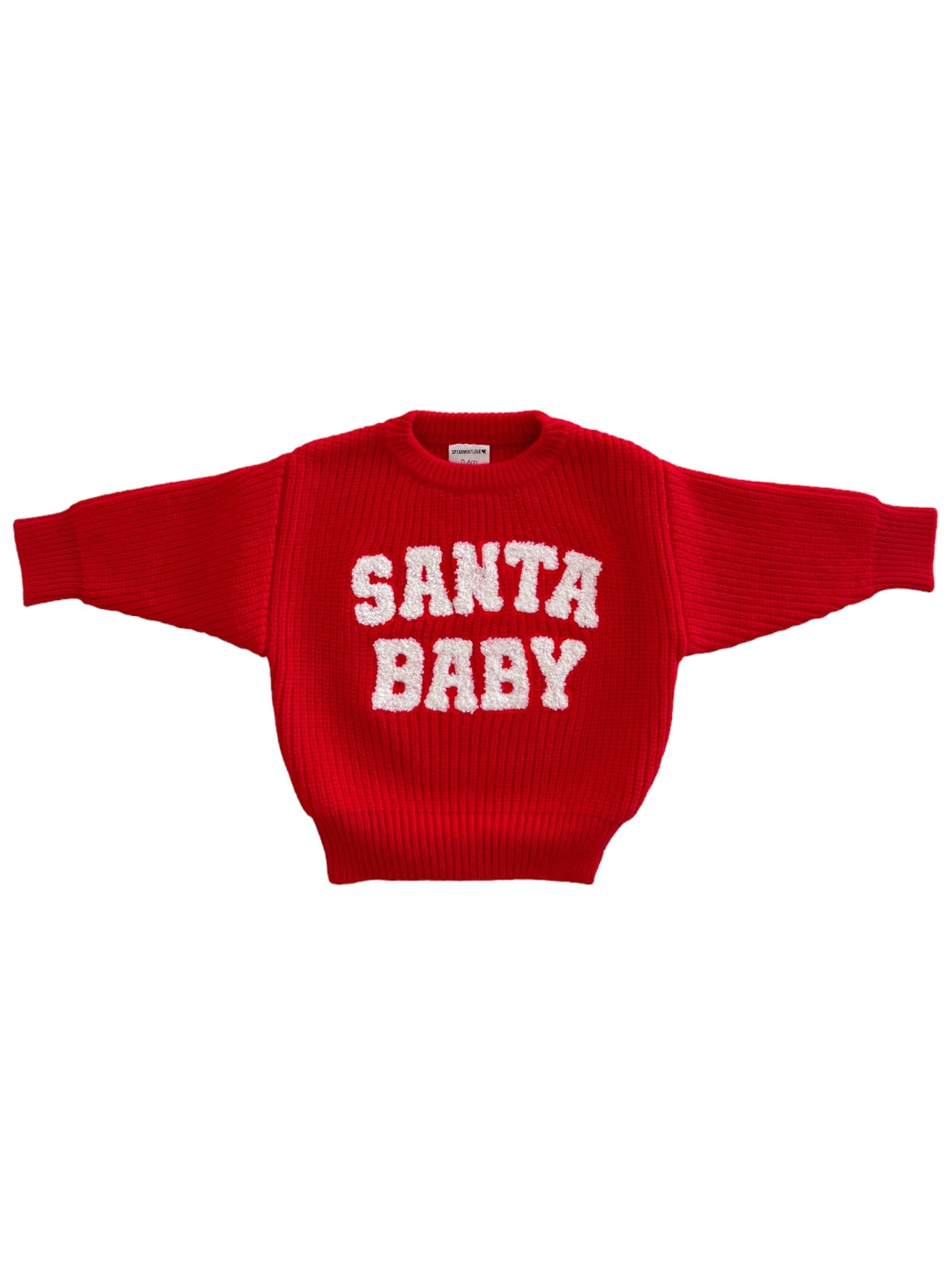 Red sweater with the text "SANTA BABY" in white, featuring a ribbed texture and oversized sleeves.