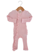 Light pink baby onesie with ruffle detail, hanging on a wooden hanger. Ideal for infants and toddlers.