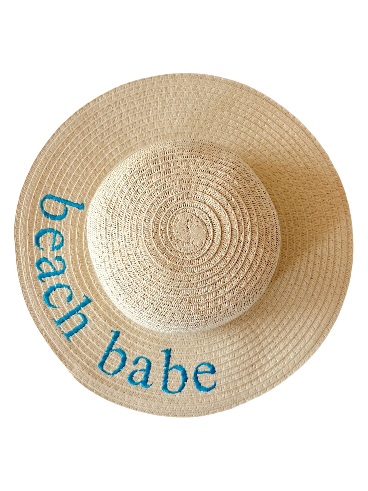 Wide-brimmed straw hat with "beach babe" embroidered in blue. Ideal for sun protection and stylish beachwear.