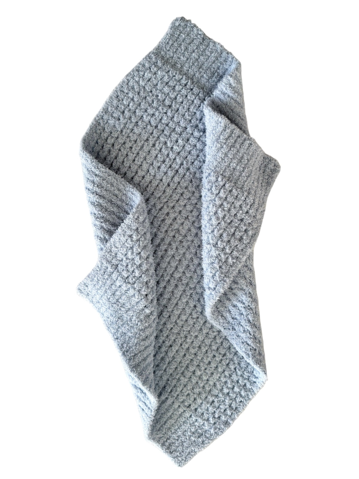 Gray textured blanket draped elegantly on a white background.