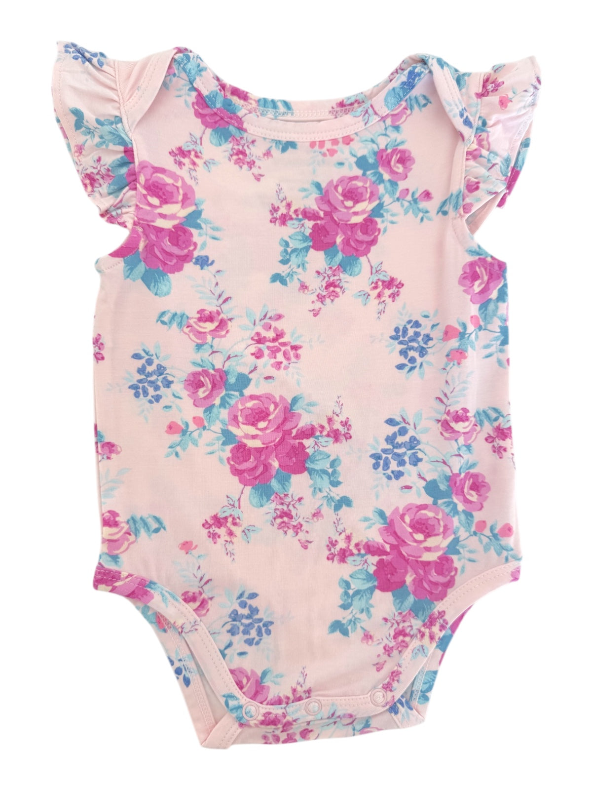Floral baby onesie with pink and blue roses on a light pink background, featuring ruffled sleeves.