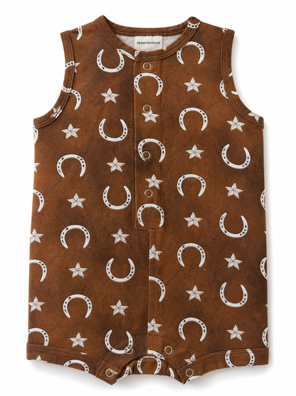 Brown toddler romper with white star and crescent moon print, featuring buttons and a soft fabric design.