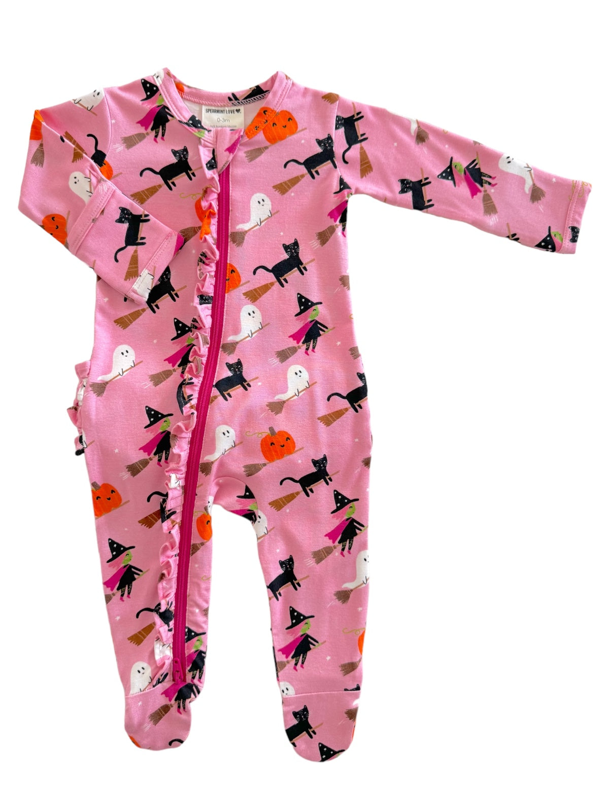 Pink pajama onesie with black cats, ghosts, and pumpkins in a festive Halloween theme.