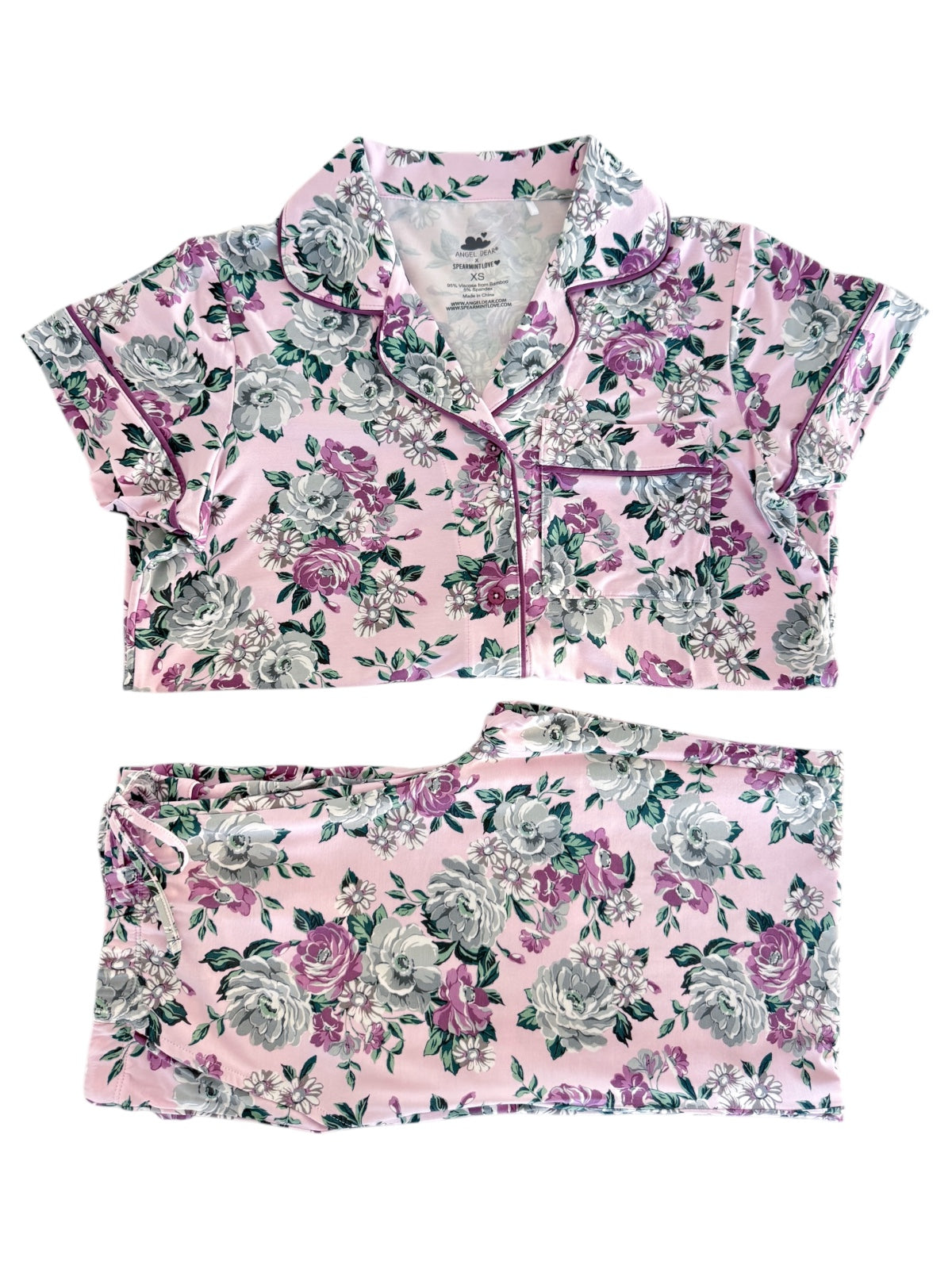 Floral pink pajama set featuring short sleeves and a comfortable, relaxed fit. Perfect for cozy nights.