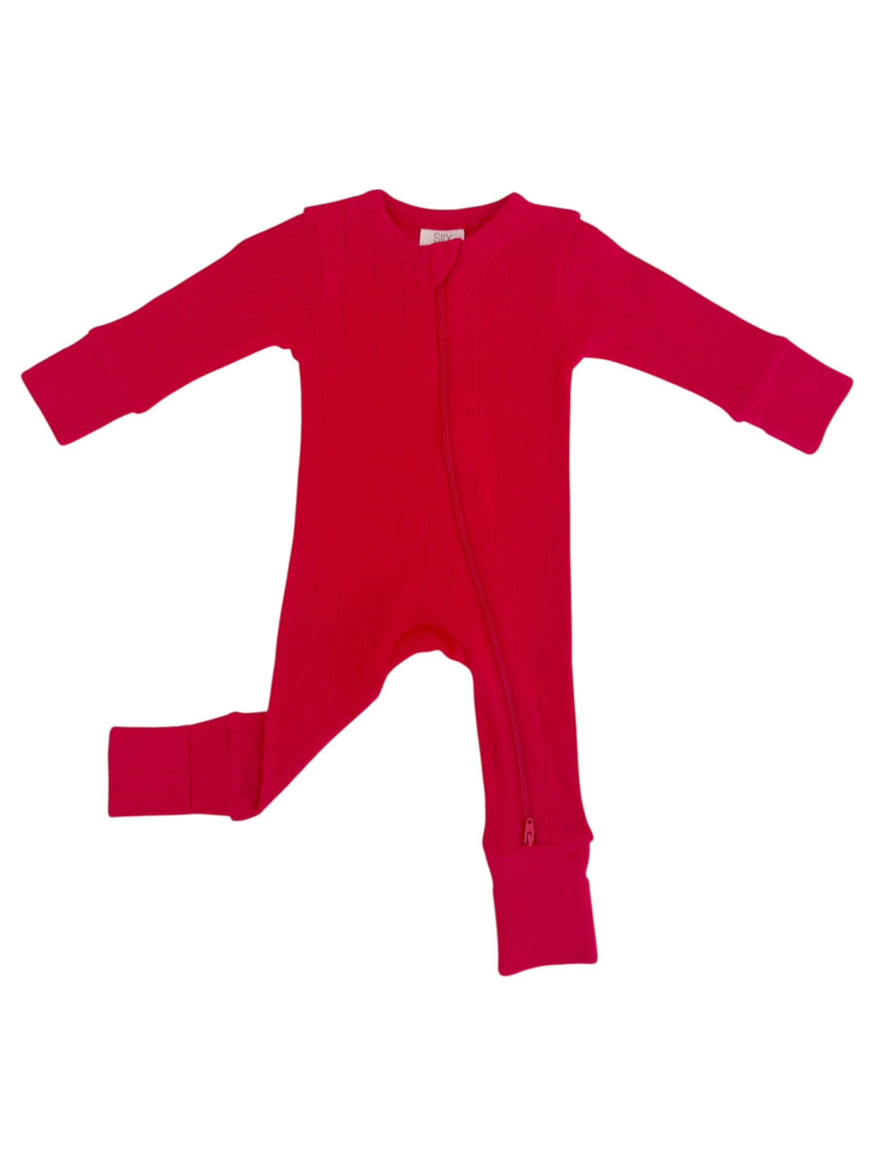 Bright pink ribbed baby onesie with a front zipper and long sleeves.