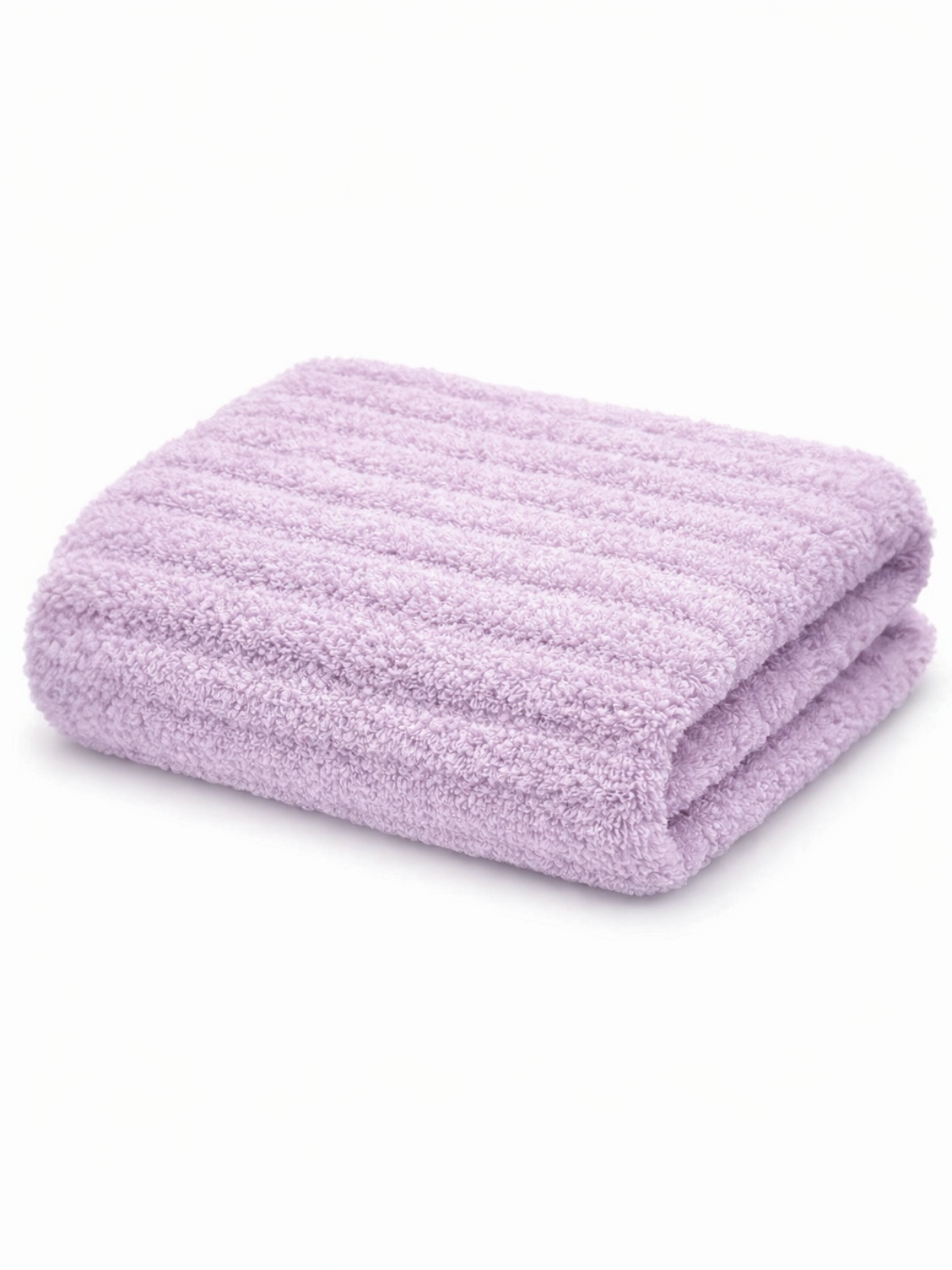 Folded lavender towel with a textured pattern against a white background. Soft and plush texture visible.