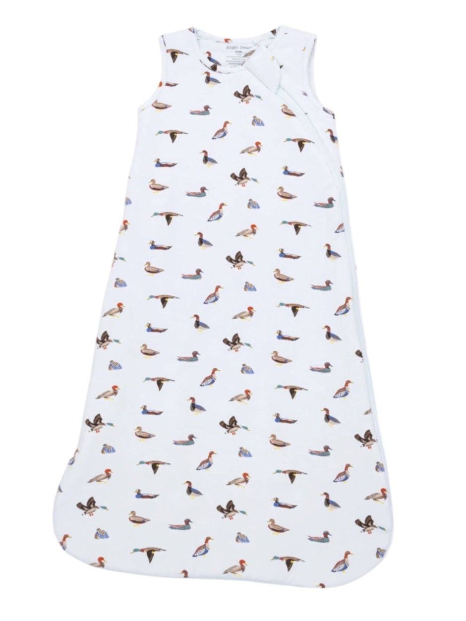 White baby sleep sack with a colorful duck pattern throughout.