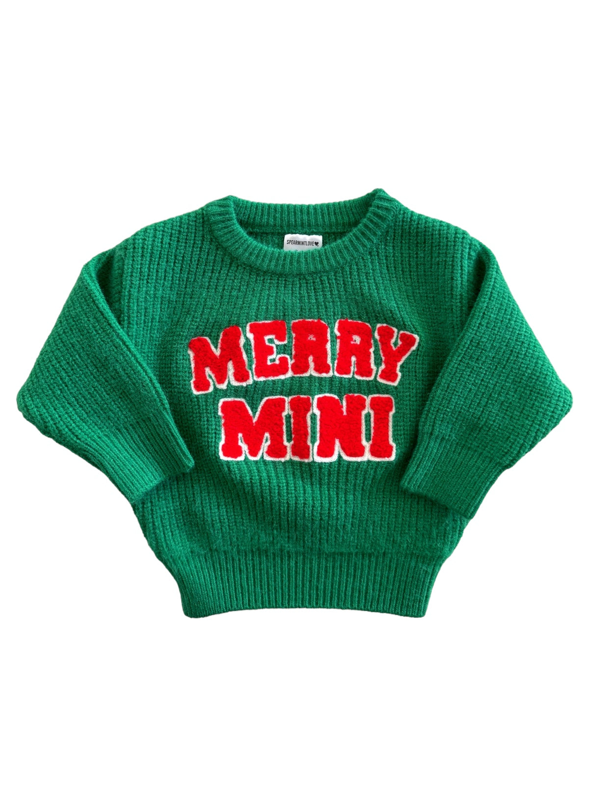Green knit sweater with "MERRY MINI" in bold red letters centered across the front.