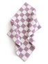 Purple and white checkered fabric draped on a flat surface, showcasing its soft texture and pattern.
