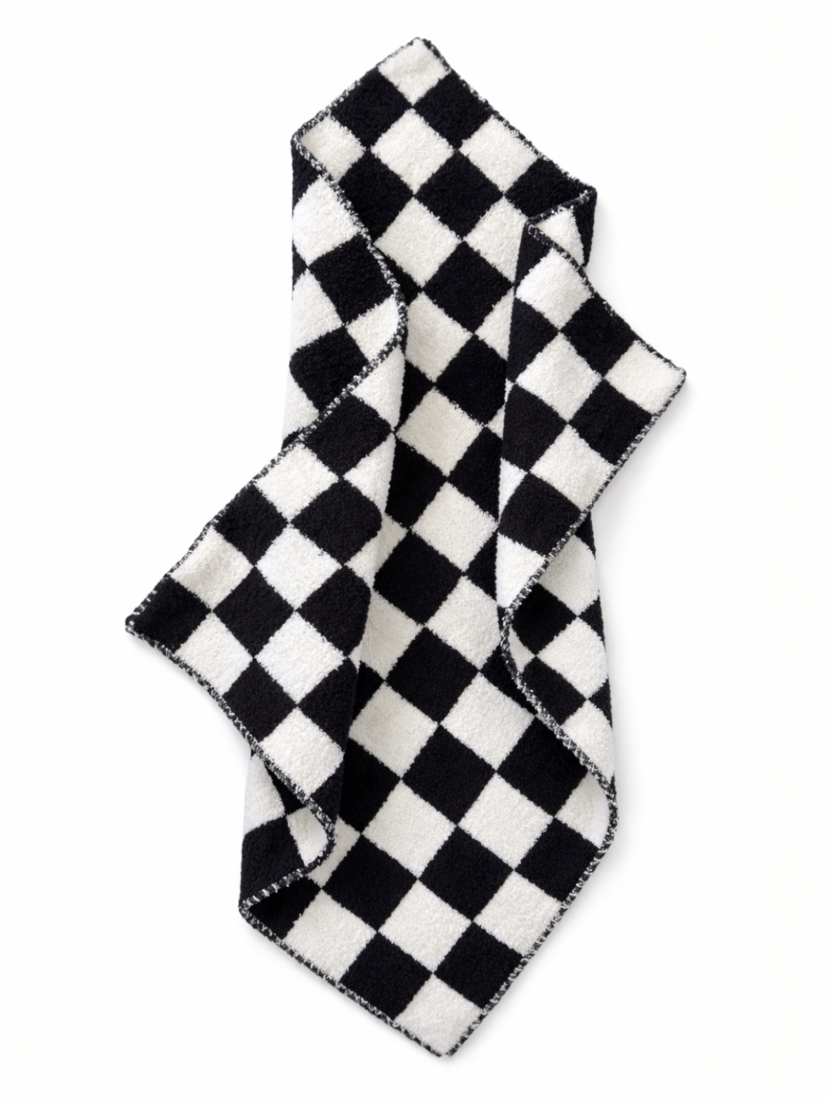 Black and white checkered towel draped elegantly on a light background.