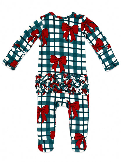 Red bow-patterned baby romper with long sleeves and ruffled detail at the back. Perfect for festive occasions.