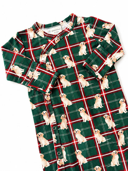 Green plaid infant pajama with playful dog prints, suitable for ages 0-3 months.