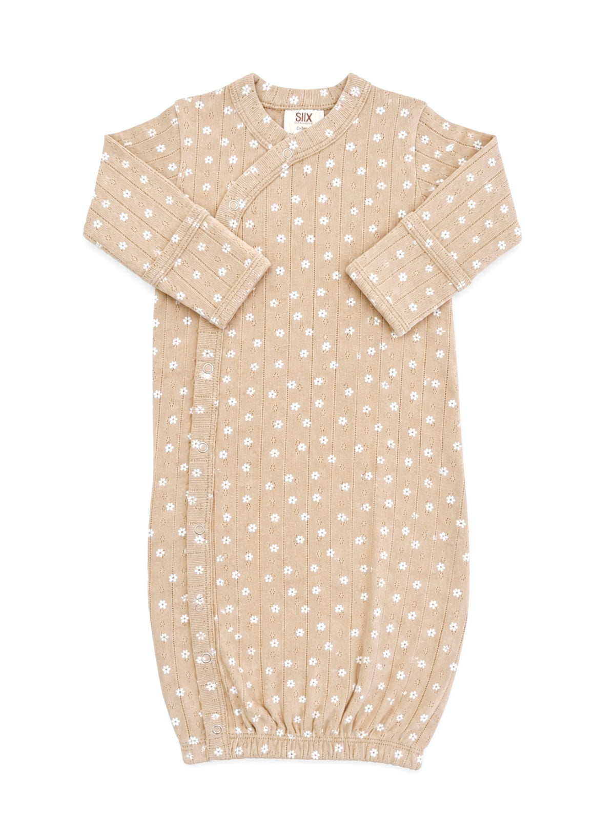 Beige infant sleeping gown with white floral pattern and ribbed texture, featuring snap closures and gathered hem.