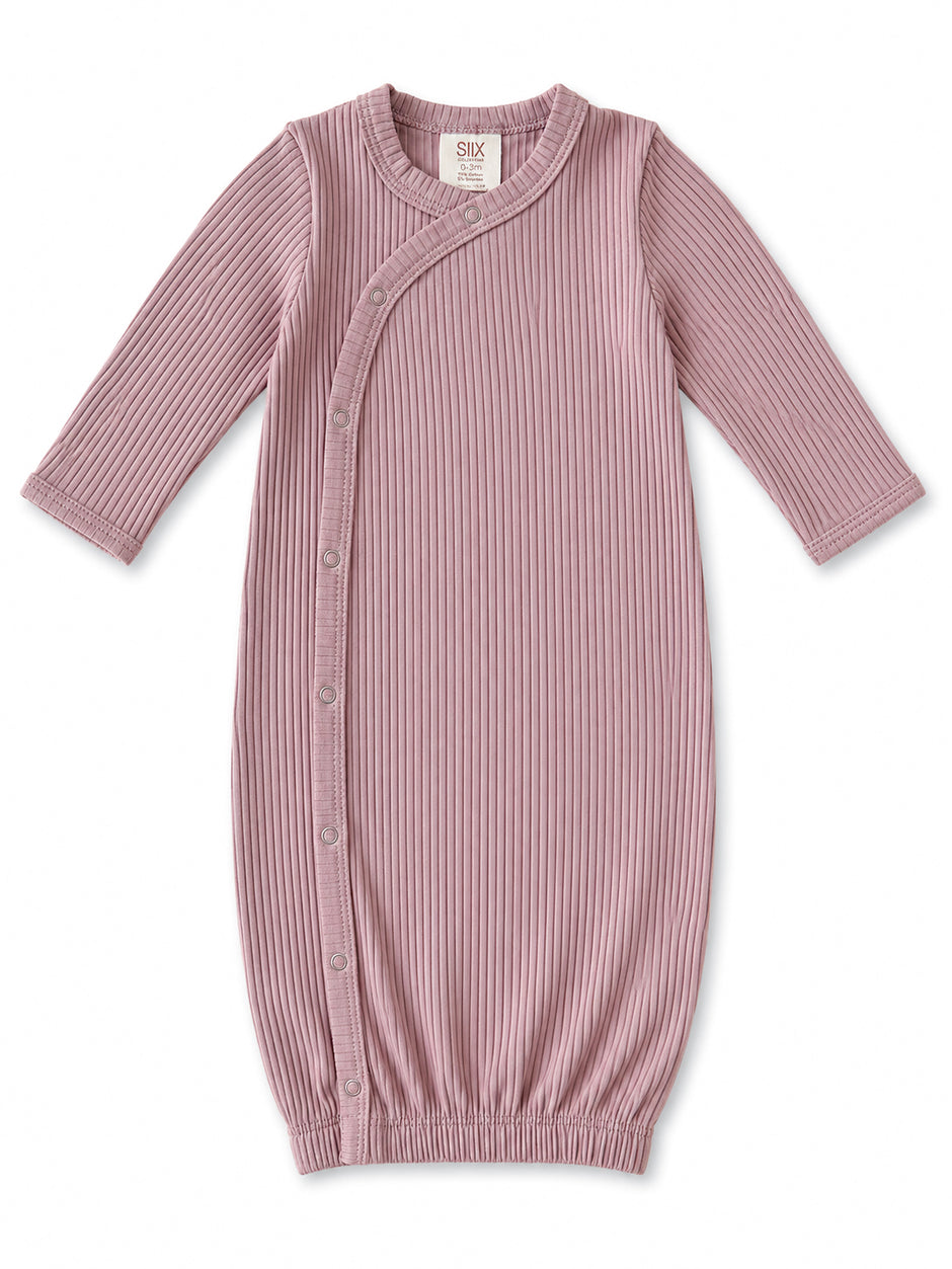 Light pink ribbed baby gown with long sleeves and snap closure, ideal for infants 0-3 months.