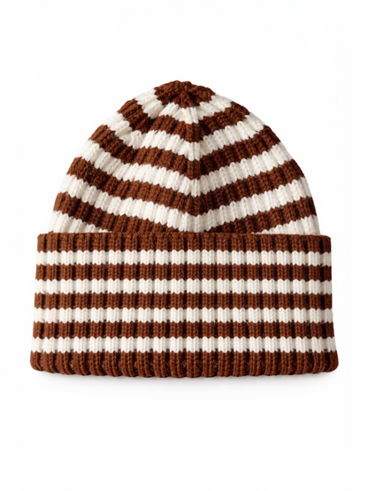 Brown and white striped knit beanie with a ribbed cuff.