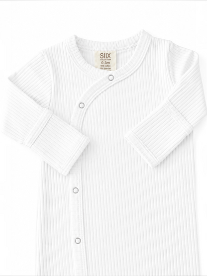White ribbed baby bodysuit with snap buttons, made from 95% cotton and 5% spandex, size 0-3 months.