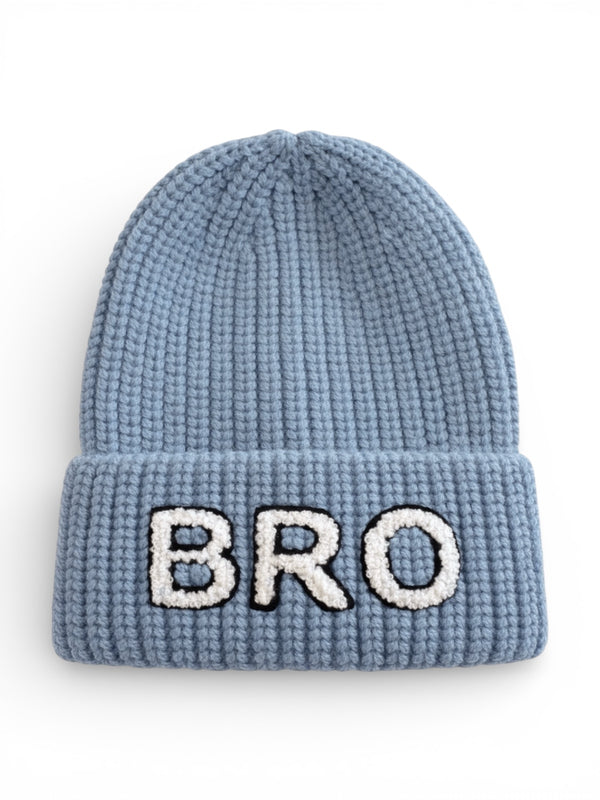 Blue knit beanie with a folded brim, featuring the word "BRO" in white text.