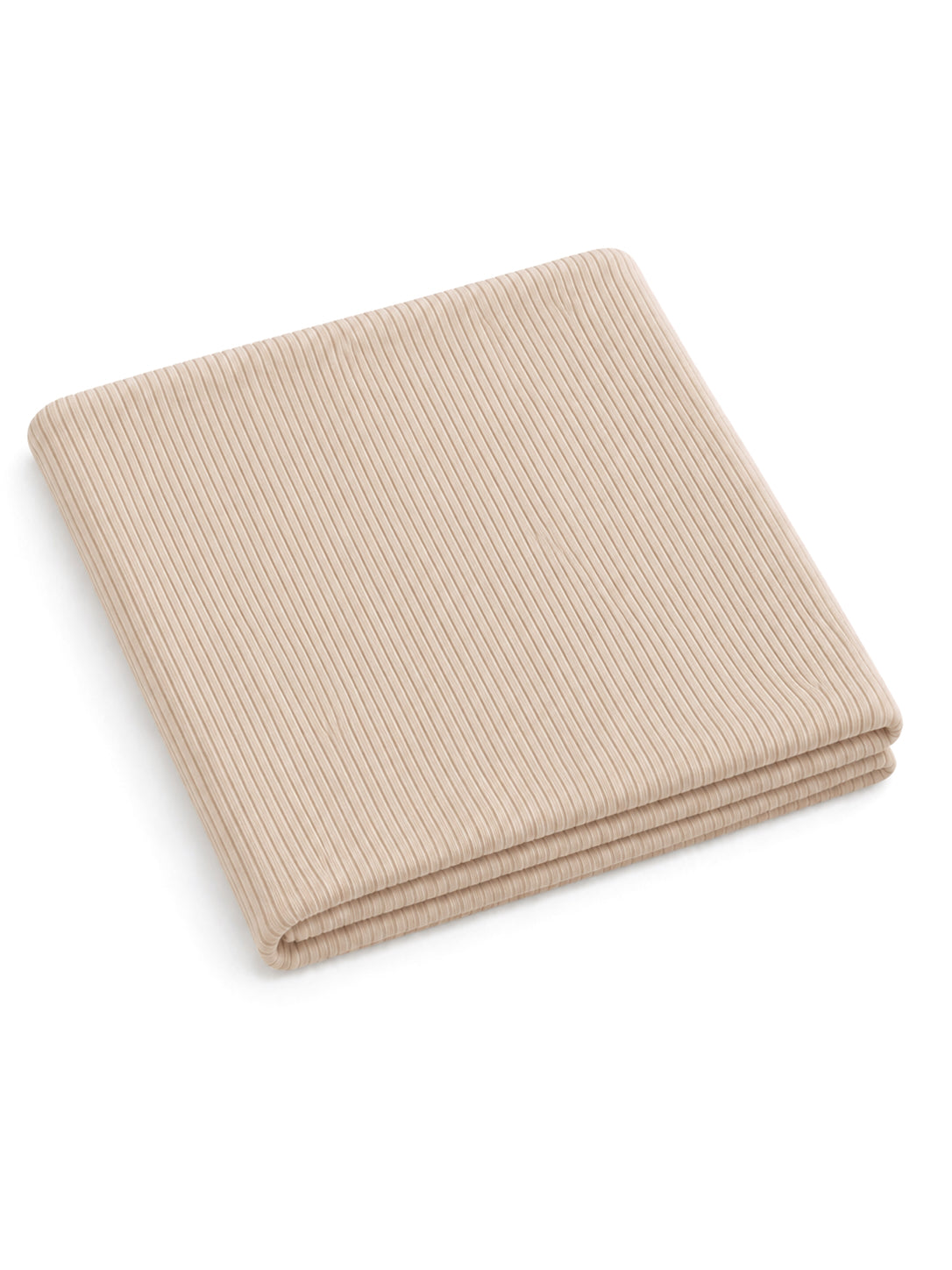 Folded beige ribbed fabric, soft and textured, ideal for home decor or crafting projects.