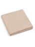 Folded beige ribbed fabric, soft and textured, ideal for home decor or crafting projects.
