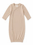 Beige ribbed baby gown with long sleeves and snap buttons, designed for newborns up to 3 months.