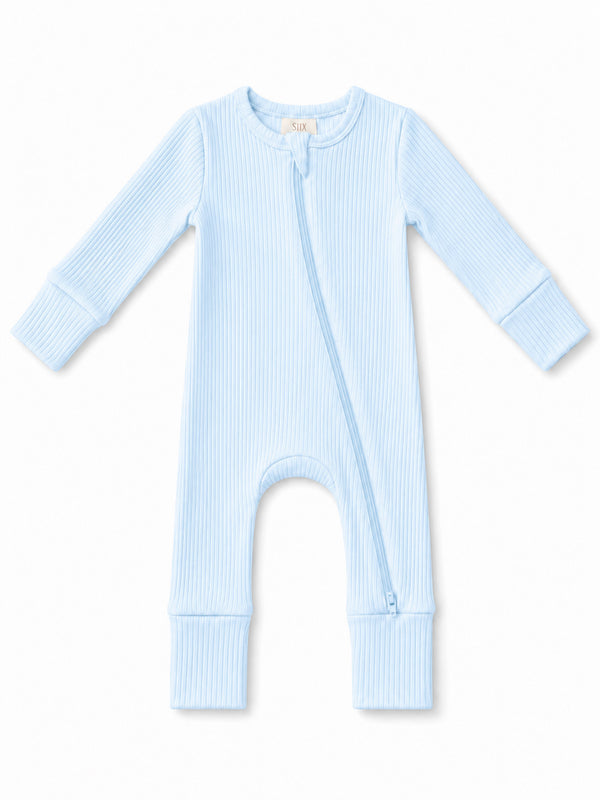 Light blue ribbed baby onesie with a front zipper and long sleeves.