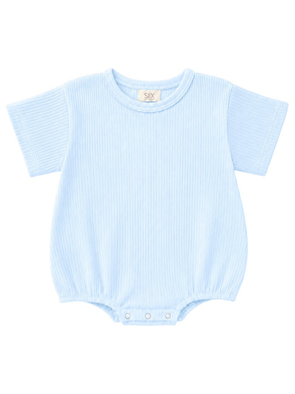 Light blue baby romper with short sleeves and snap closures at the bottom. Ideal for warm weather and comfortable play.