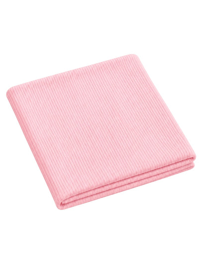 Pink ribbed fabric folded neatly on a white background. Ideal for various crafting projects or home decor.
