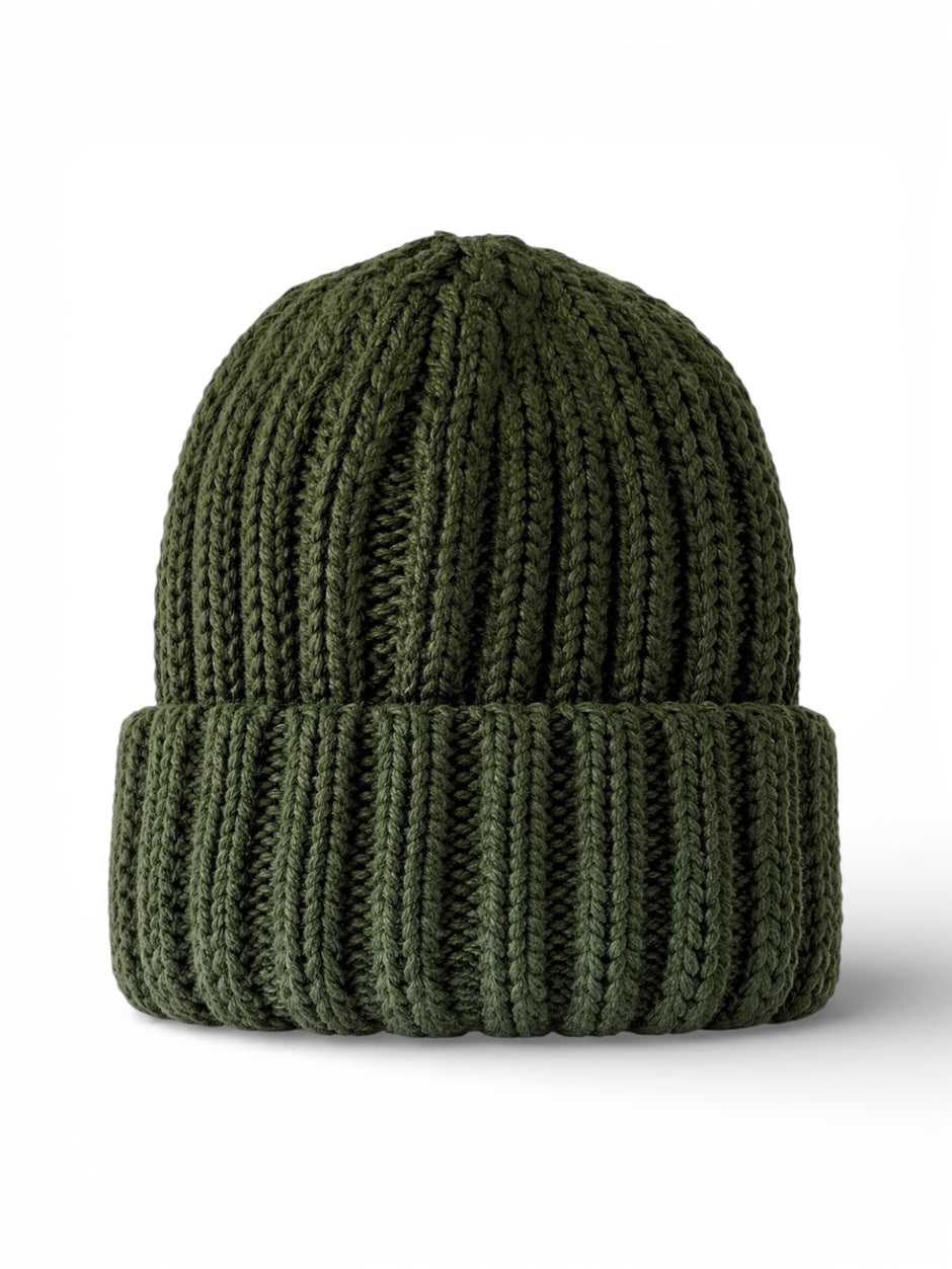 Green knitted beanie hat with a ribbed design, folded brim, displayed against a white background.