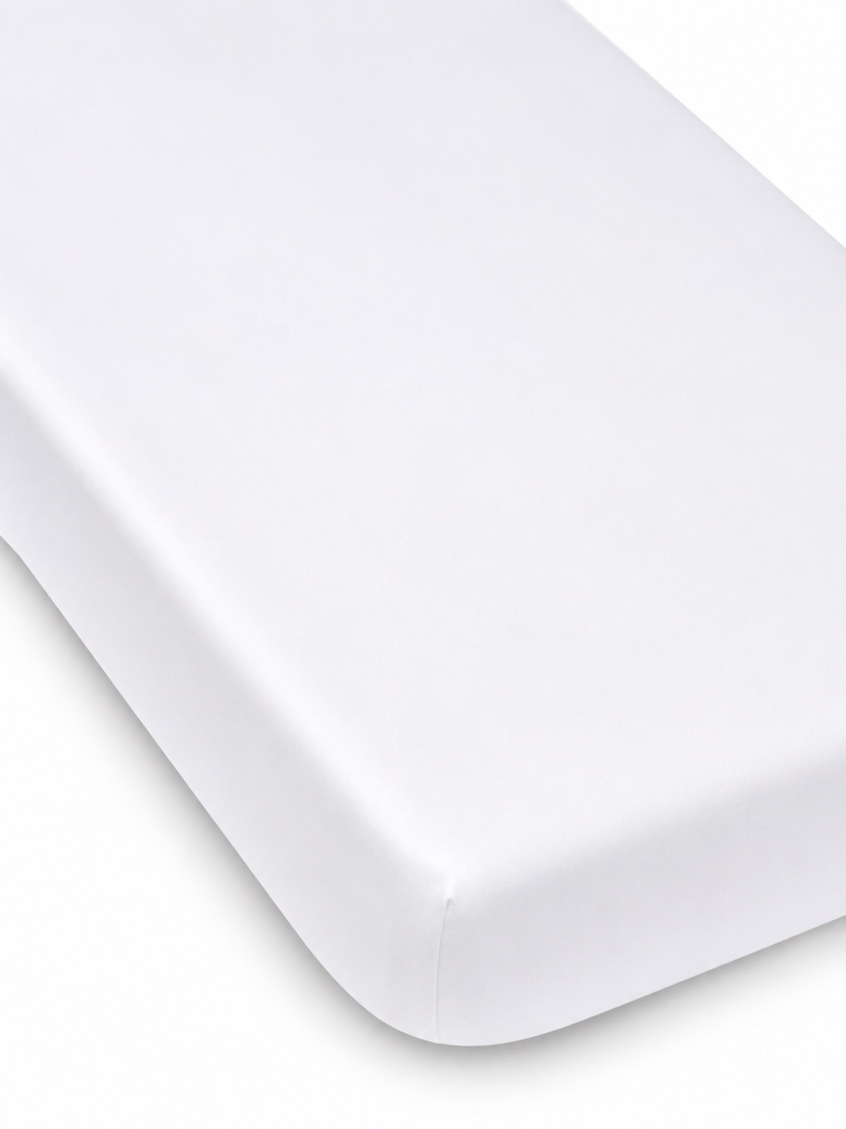 White mattress corner on a light background, featuring a smooth, clean finish. Ideal for a minimalist aesthetic.