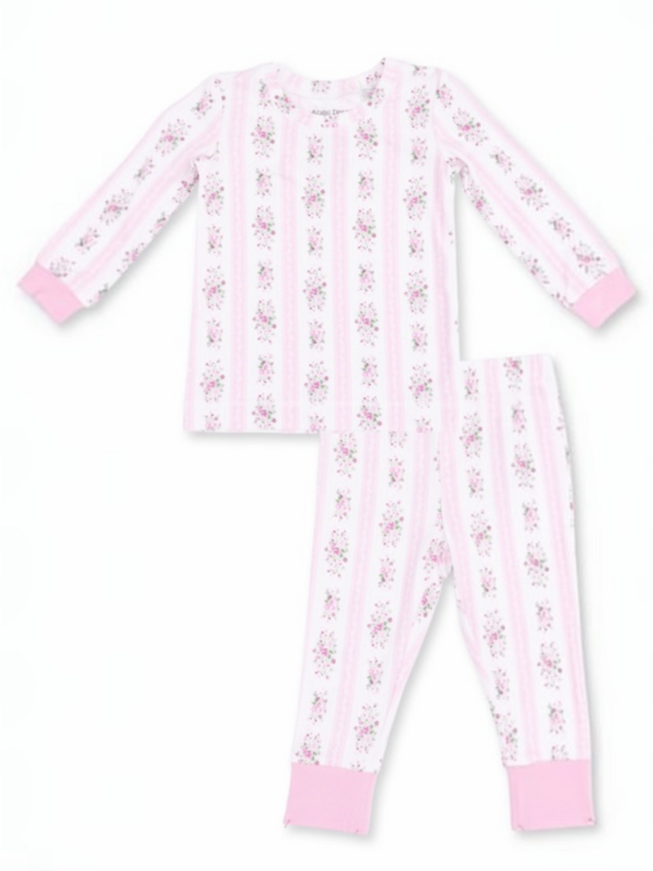 Children's pink and white striped pajamas with floral patterns and fitted cuffs. Ideal for cozy sleepwear.