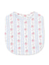 Floral-patterned baby bib with pastel colors and button closure, featuring a blue and white striped design.