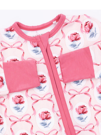 Pink floral-patterned onesie with a zipper, featuring rose prints and matching sleeves in a soft, cozy fabric.