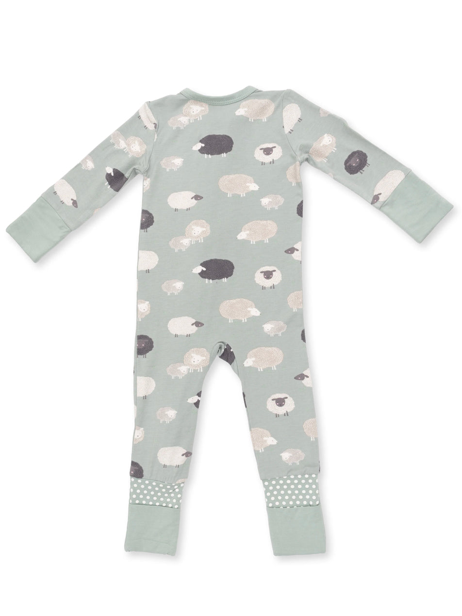 Green baby onesie with sheep patterns and dotted cuffs, shown from the back. Ideal for comfort and fun style.