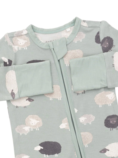 Light green baby onesie adorned with cartoon sheep patterns, featuring a front zipper and fold-over cuffs.