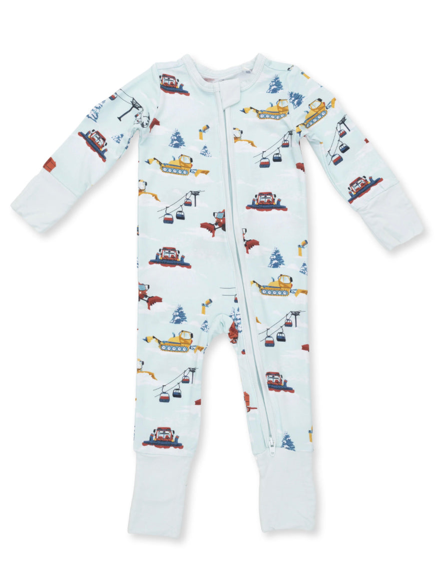Children's winter-themed onesie featuring colorful snowplows, lifts, and trees on a light blue background.
